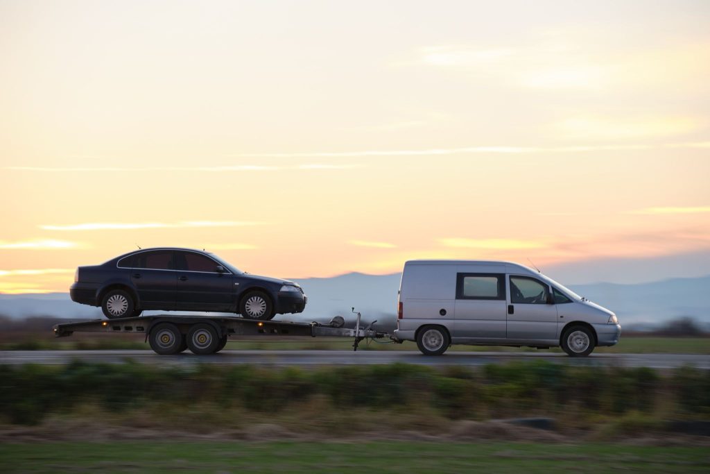 Which equipment is necessary to tow a car safely?